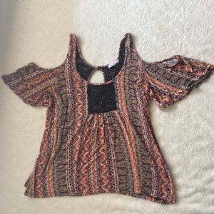 medium shirt with the shoulders cut out. Brand is Full Tilt bought at Tilly’s